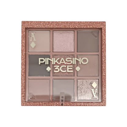 A 3CE Multi Eye Color Palette in Knotted Pink shade, containing various pink-toned eyeshadows with matte, shimmer, and satin finishes.